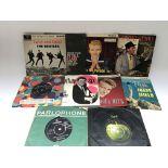 A small collection of EPs and 7inch singles by artists from the 1960 including The Beatles, Petula