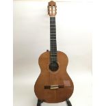 An Almansa model 434 classical guitar with a later fitted pickup beneath the saddle and control