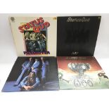 Four Status Quo LPs comprising 'Hello!', 'Quo', 'Piledriver' and 'Blue For You'. NO RESERVE.