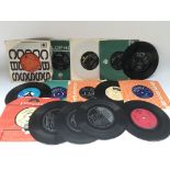 A collection of 7inch singles and EPs by various artists including The Beatles, The Rolling Stones