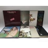 A collection of Eric Clapton and related LPs, includes the 'Blind Faith' LP, 'Money And Cigarettes',