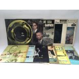 A collection in two bags of jazz LPs and 10inch records by various artists including The Modern Jazz