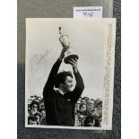 Seve Ballesteros Signed Golf Press Photo: Genuine autograph of Seve holding the British Open