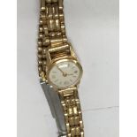 A small laddies wrist watch with 18 gold case and