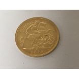 A gold Edwardian VII half sovereign dated 1906