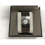 A boxed Gucci ladies twirl watch.