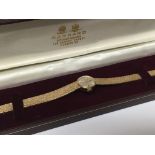 A ladies 9carat gold watch in a fitted box with at