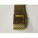 A 18 ct gold omega wrist watch the square dial wit