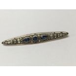 A 9 ct white gold Art Deco style brooch inset with