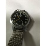 A buren military watch with steel case and strap ,