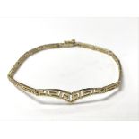 A 14ct gold bracelet marked 585. Weighing in total