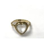 An 18ct gold heart shaped ring, the approximate ri