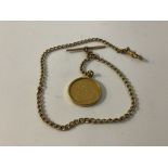 An 1885 full sovereign with a 9ct gold coin mount and Albert chain, approximately 16g.