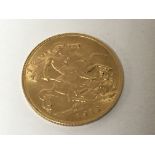 A George V half gold sovereign dated 1913