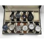 A case of 10 Ingersoll salesman sample watches (no