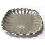 A silver dish weighing approximately 135g.