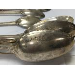 A set of six Victorian silver desert spoons and th