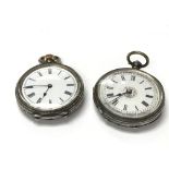 Two silver pocket watches.