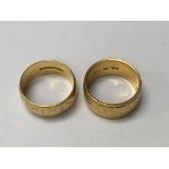 Two 22 ct wedding bands total weight 13 grams.