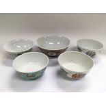 Five Oriental bowls, largest diameter approx 16cm.