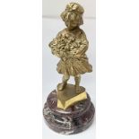 A Louchet bronze figure of a girl holding flowers