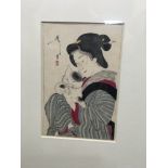 A framed Japanese wood block print from the Art Wo