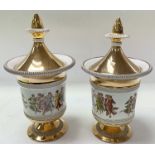 A pair of lidded Italian vases decorated with gilt