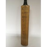 A 1950s signed cricket bat the bat made by Stuart