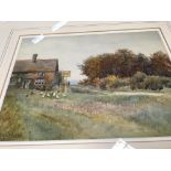 A framed watercolour depicting country side view s