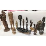 A collection of tourist tribal art wood and stone