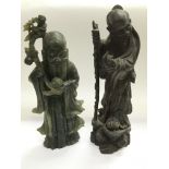 Two carved Chinese long life figures of elders com