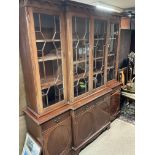A large modern breakfront bookcase/cabinet (No Res