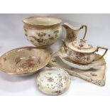 A collection of Crown Devon ceramics in blush ivor