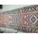 A Persian style runner with geometric design on a