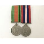 Two II world war medals the defence medal and Vict