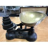 A Salter brass and Iron set of kitchen scales and