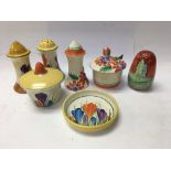 A collection of Clarice Cliff cruets including for