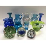 A collection of coloured glass items including two