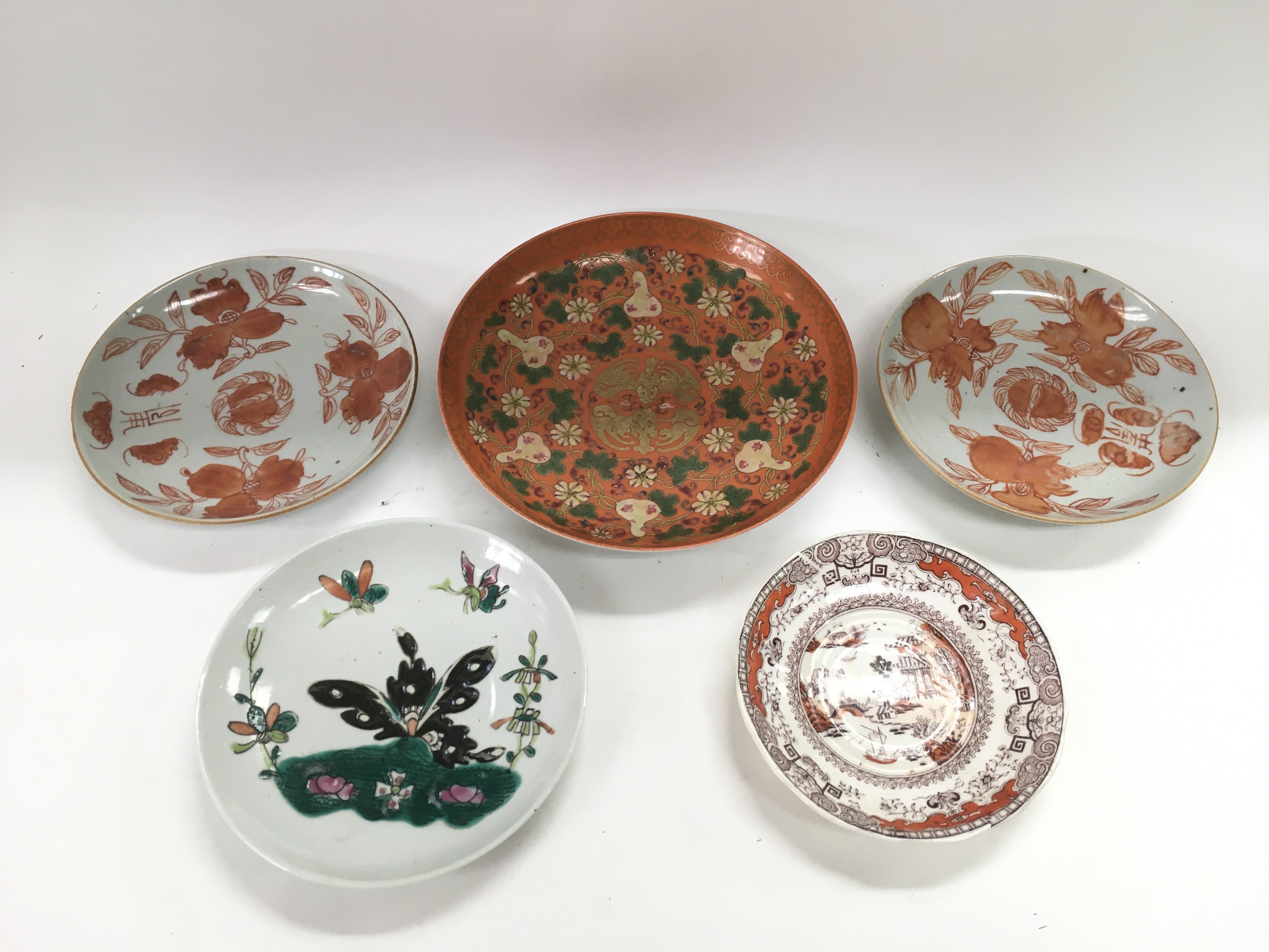 Five Oriental plates and dishes, largest approx di
