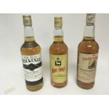 Three bottles of Vintage whisky White Horse The Re