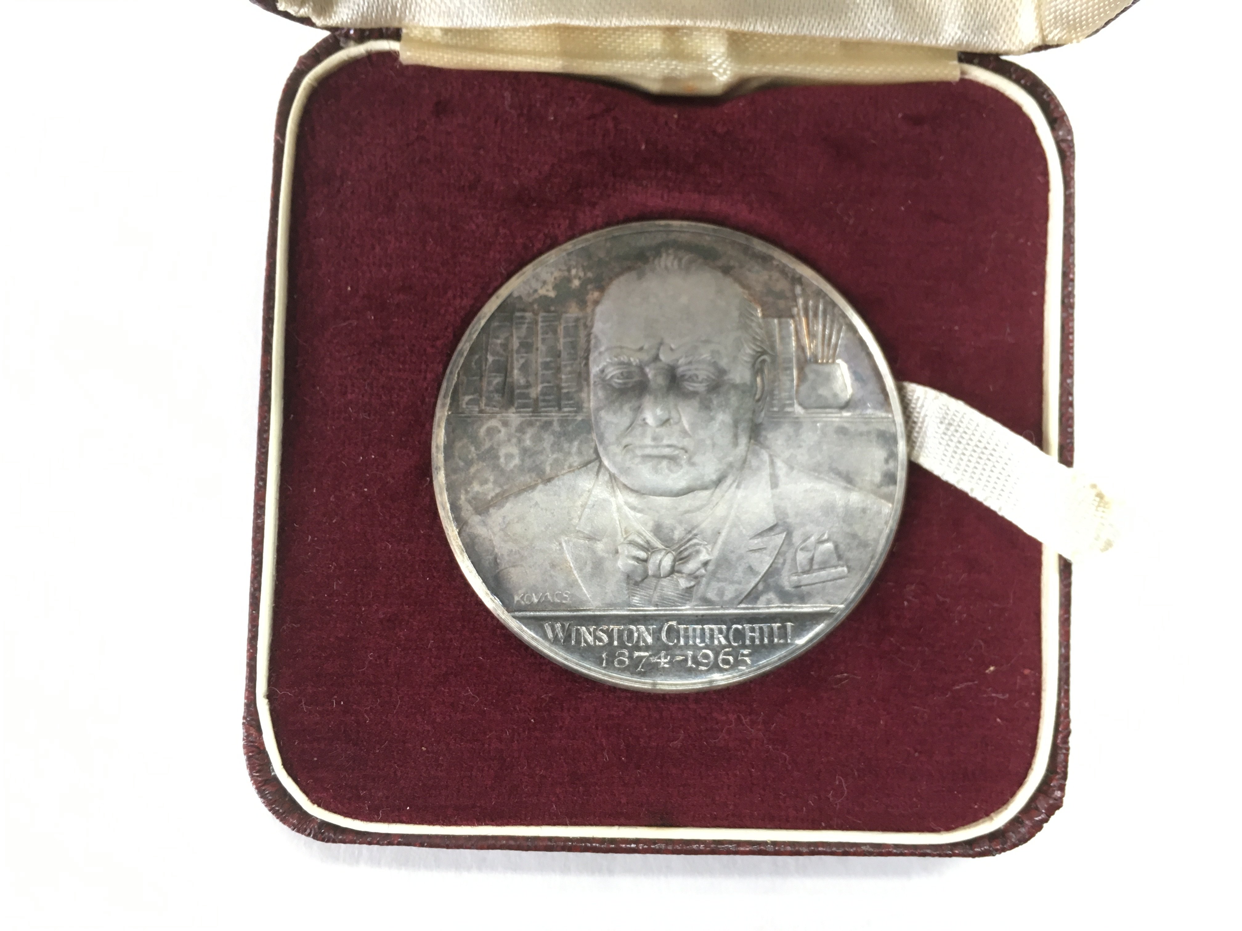 A cased commemorative medal of Winston Churchill.