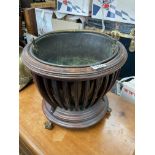 A Victorian Mahogany and brass ice bucket, with br