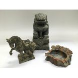 Three carved soapstone ornaments comprising a fo d