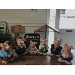 Six Wade pig money boxes.