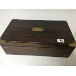 A brass bound Victorian writing box with a fitted