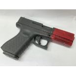 A Glock 9mm blank firer gum by Aksa Arms, serial n