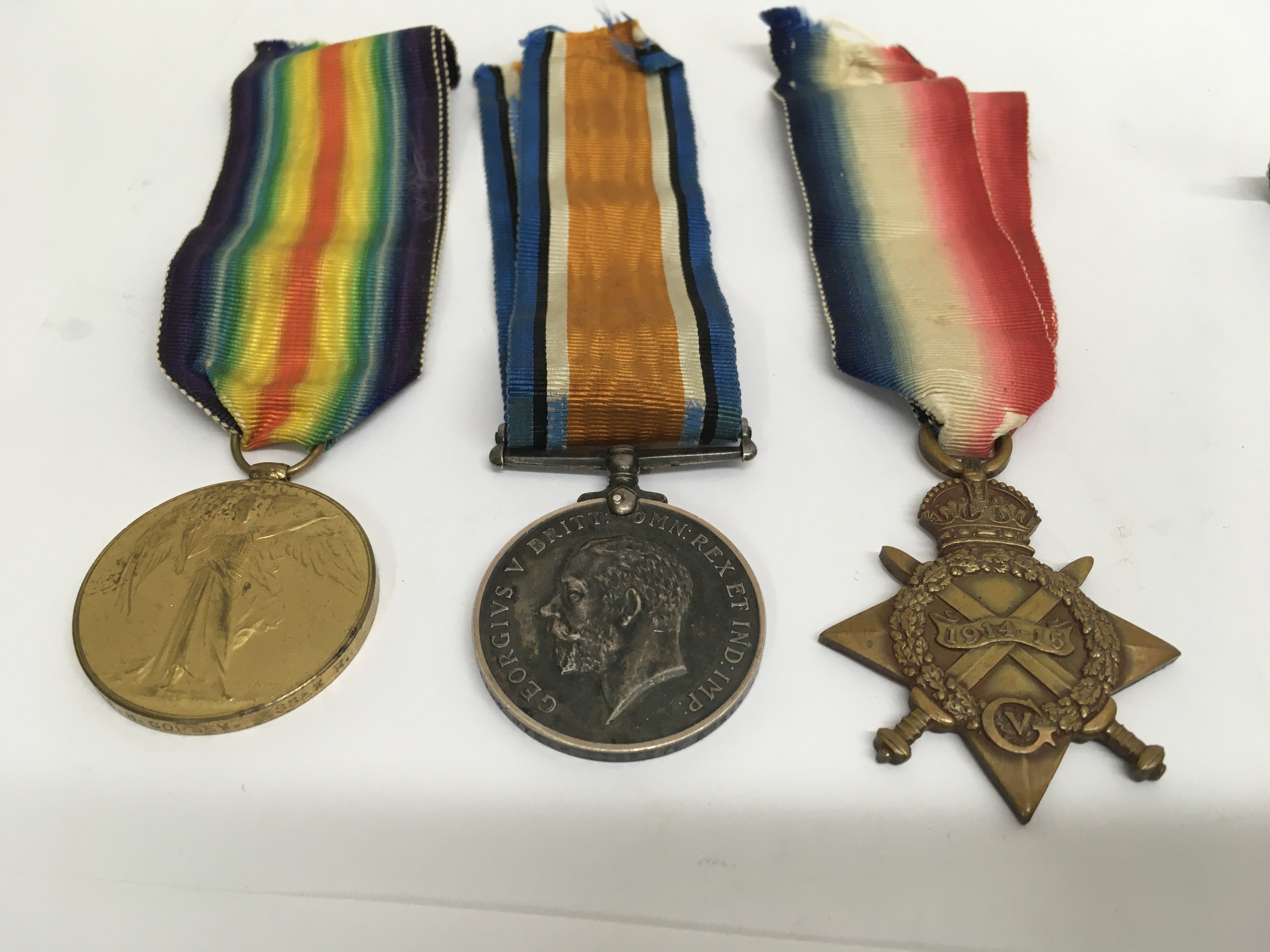 A set of three First World War medals awarded to H