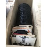 A box of 7inch singles and EPs by various artists