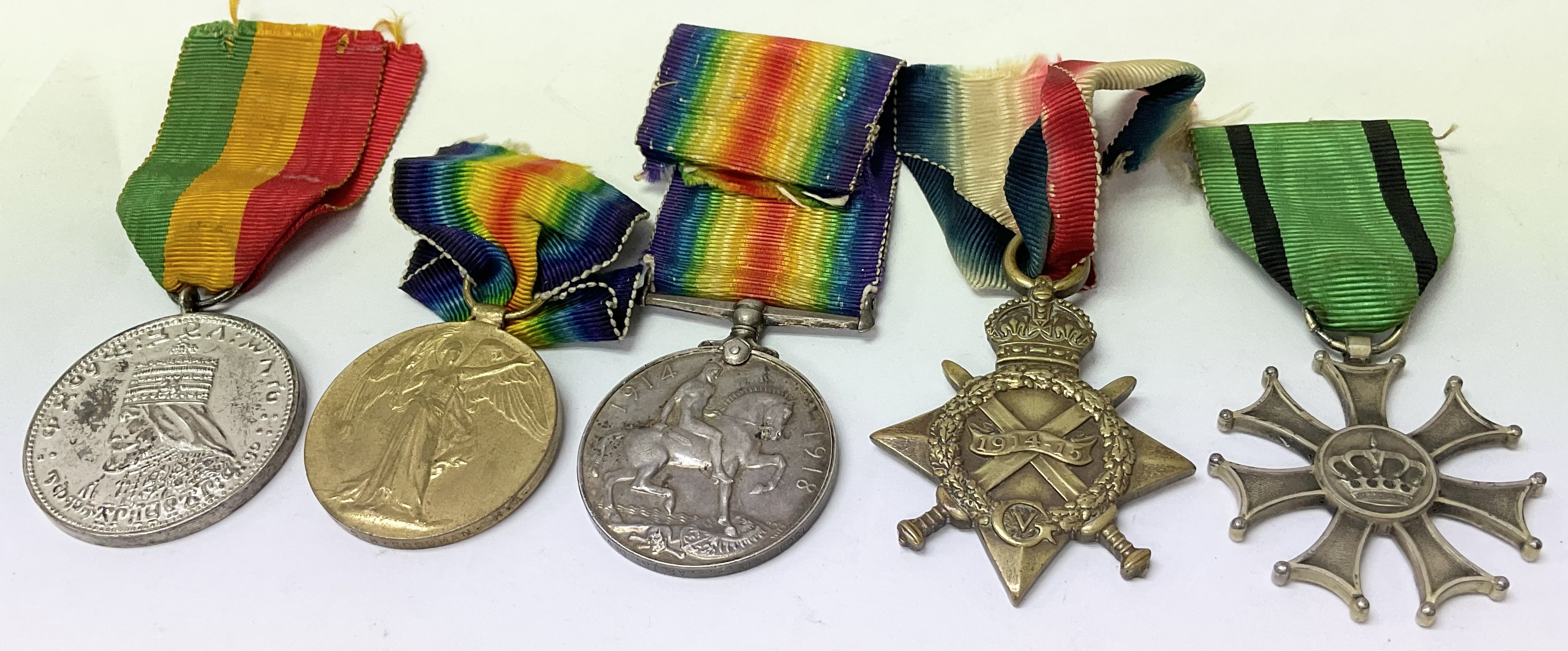 A group of five First World War medals.