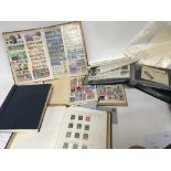 A collection of world stamps first day covers and